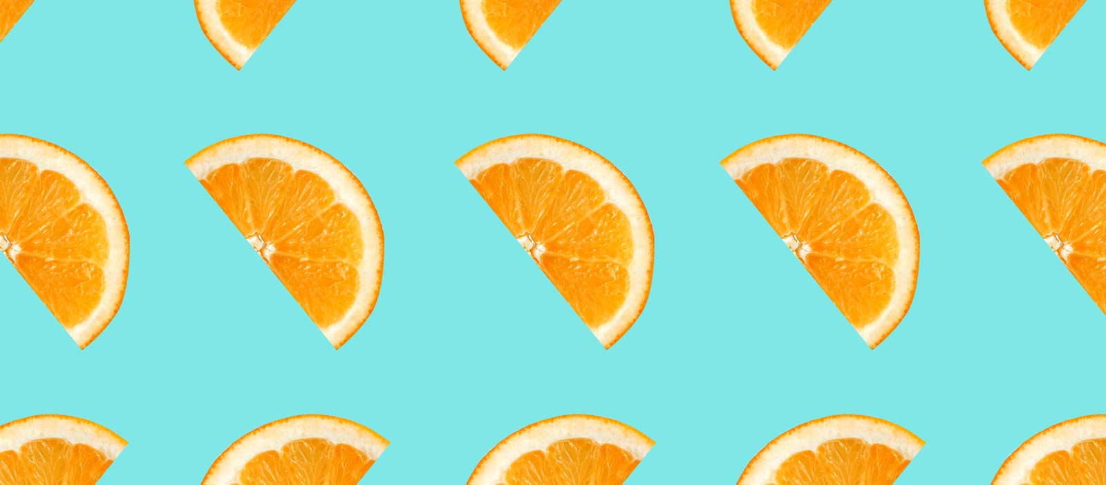 Our Response to Covid - Orange slice pattern on a light blue background